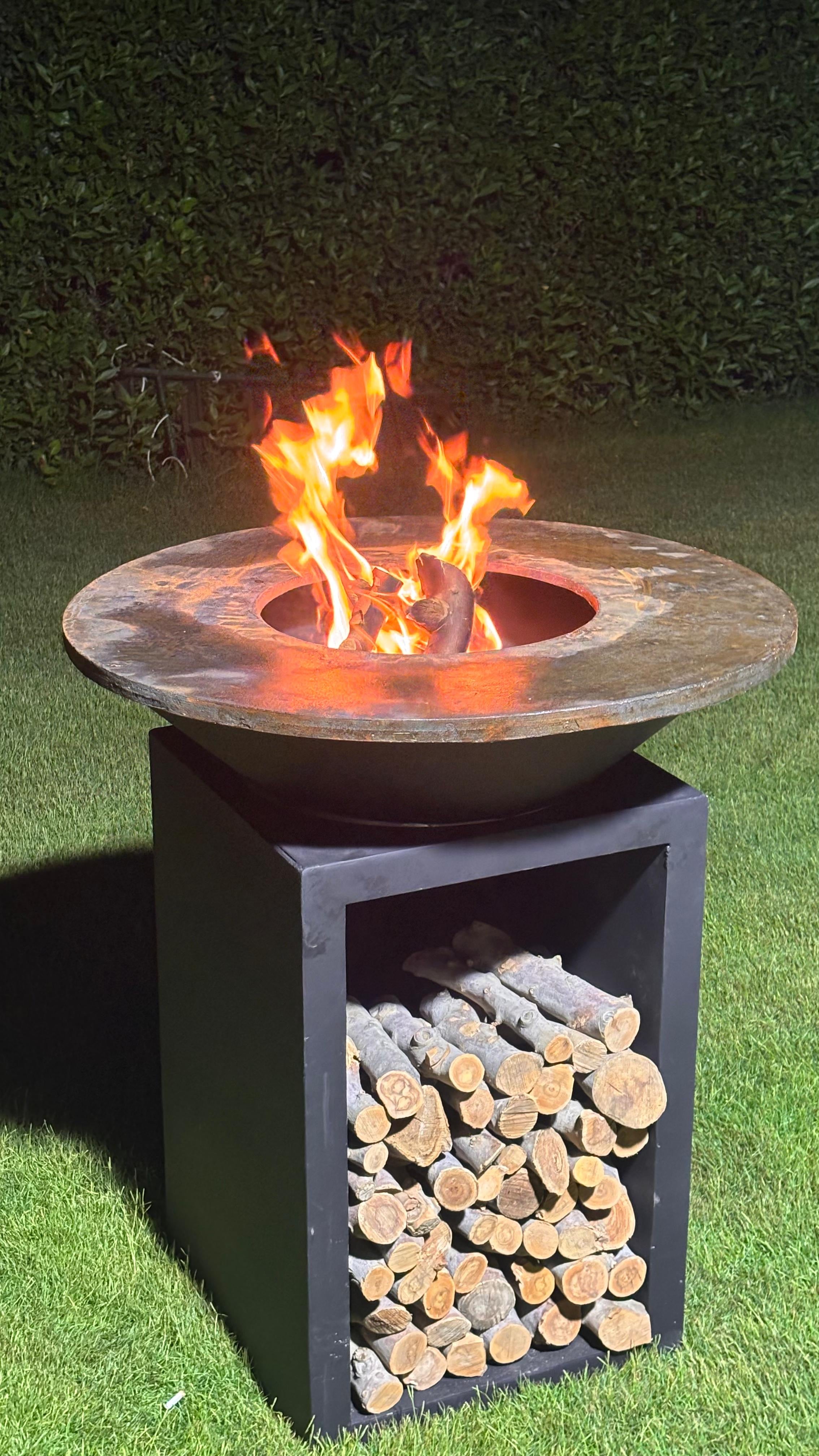 Grillit ARK 80 wood fired outdoor grill used for backyard BBQ gathering in Egypt