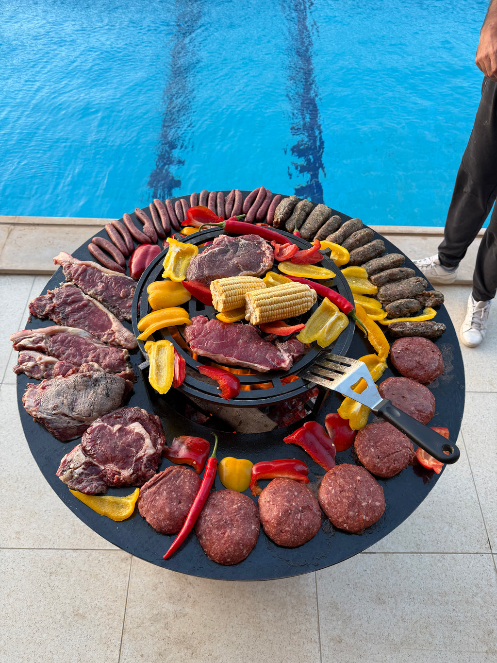 Wood burning fire bowl of Grillit ARK 80 outdoor grill for smoky flavor