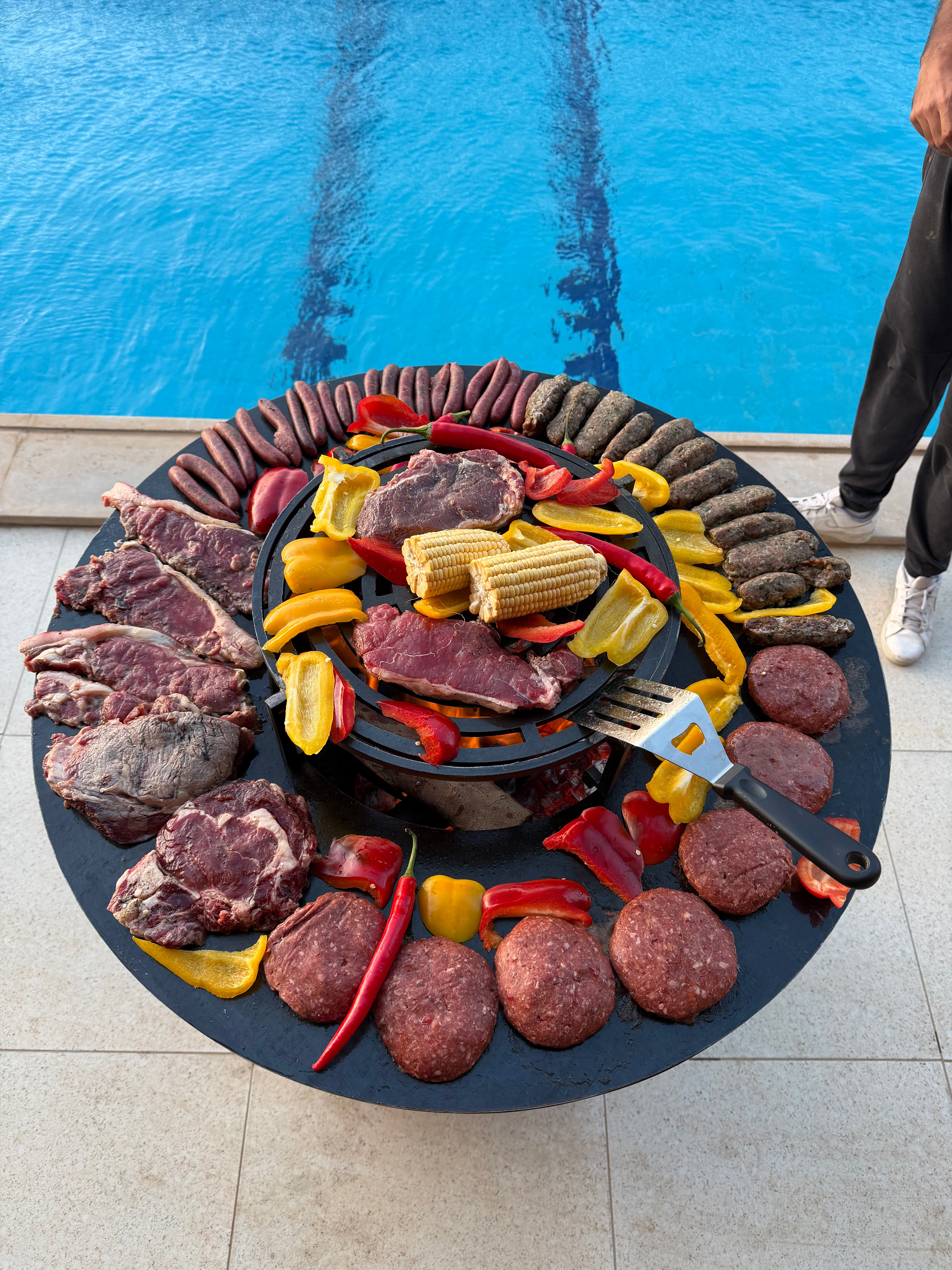 Wood burning fire bowl of Grillit ARK 80 outdoor grill for smoky flavor