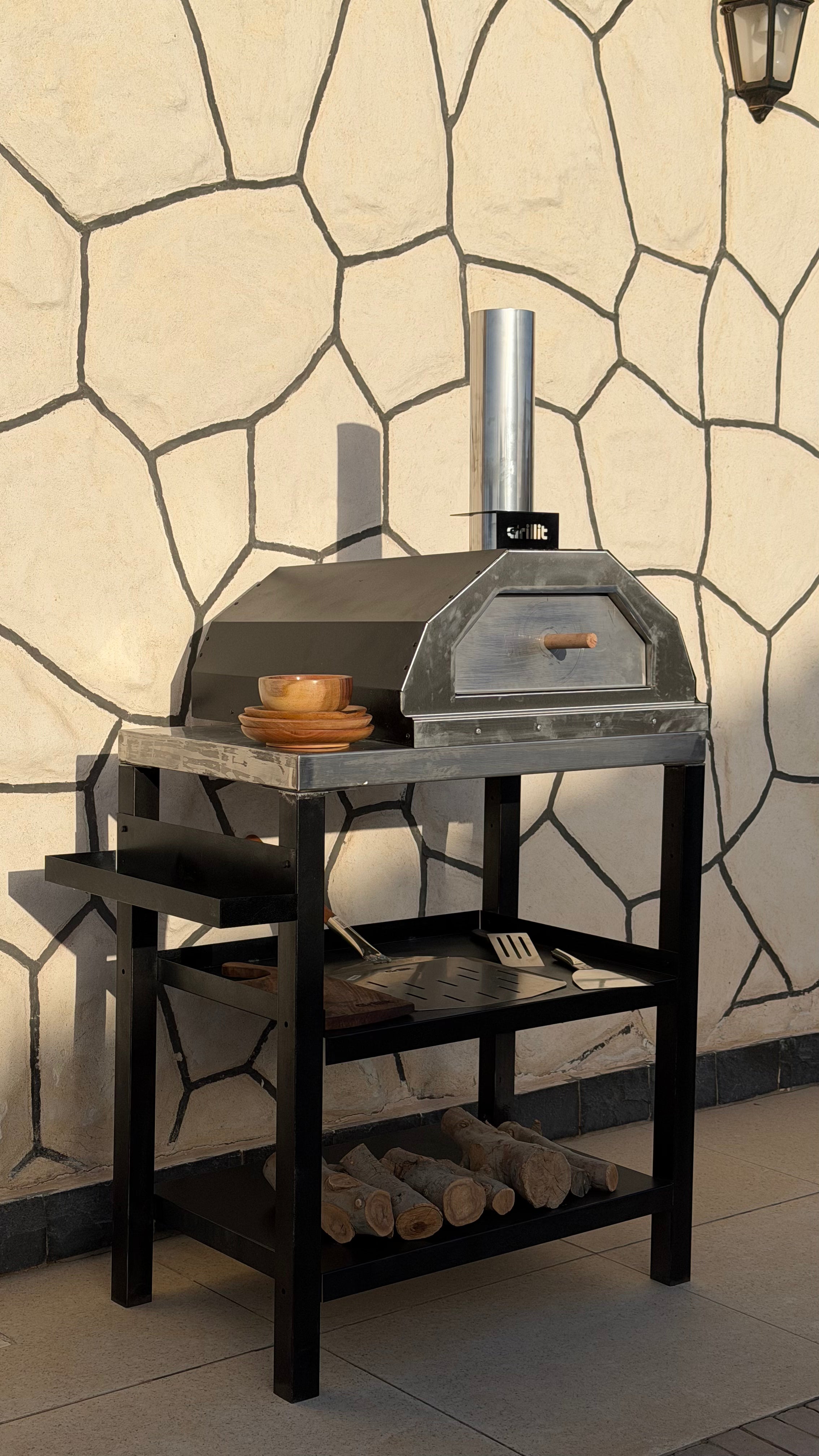 Grillit outdoor wood fired pizza oven setup in backyard garden in Egypt