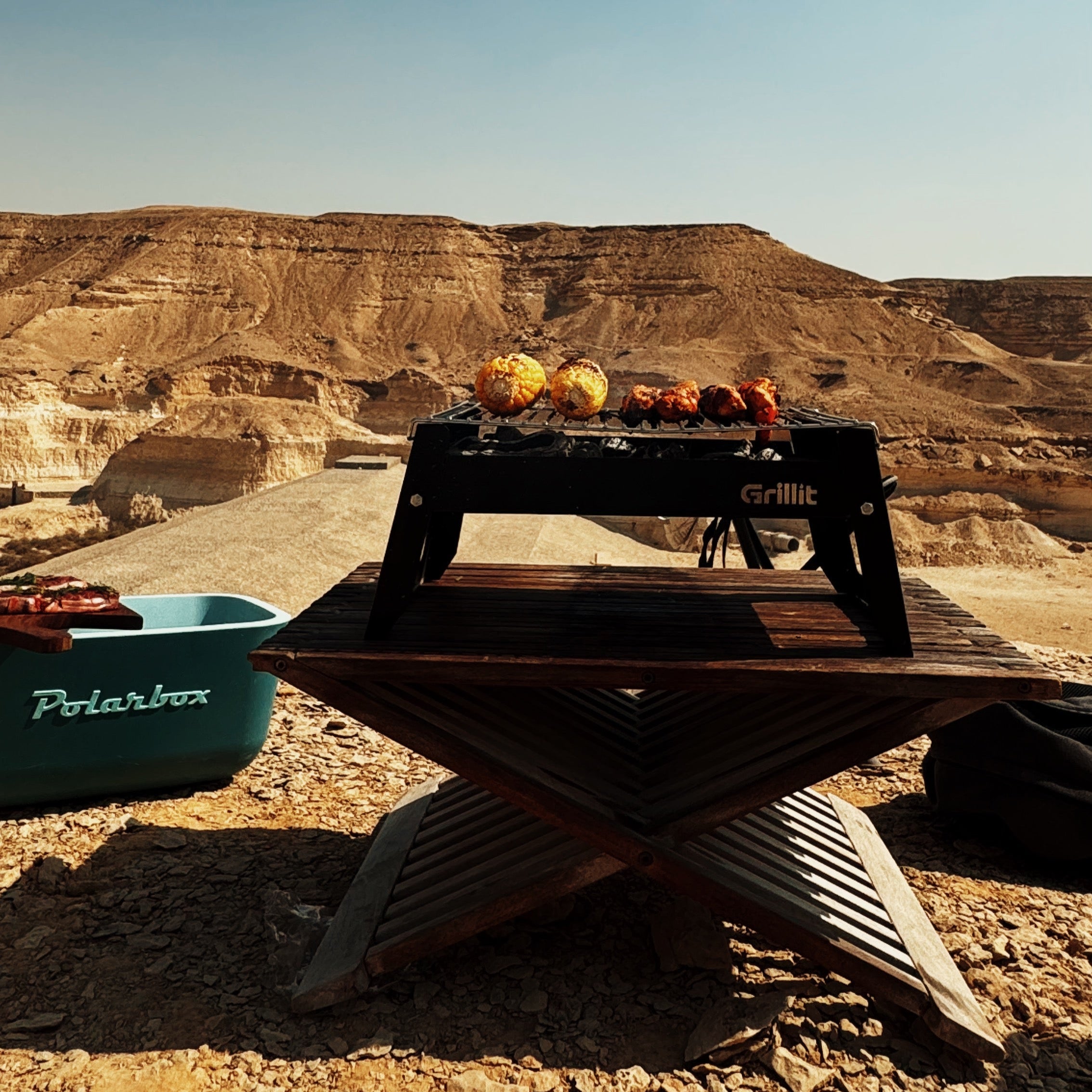 Portable Grillit Slim BBQ grill used for camping and beach trips in Egypt