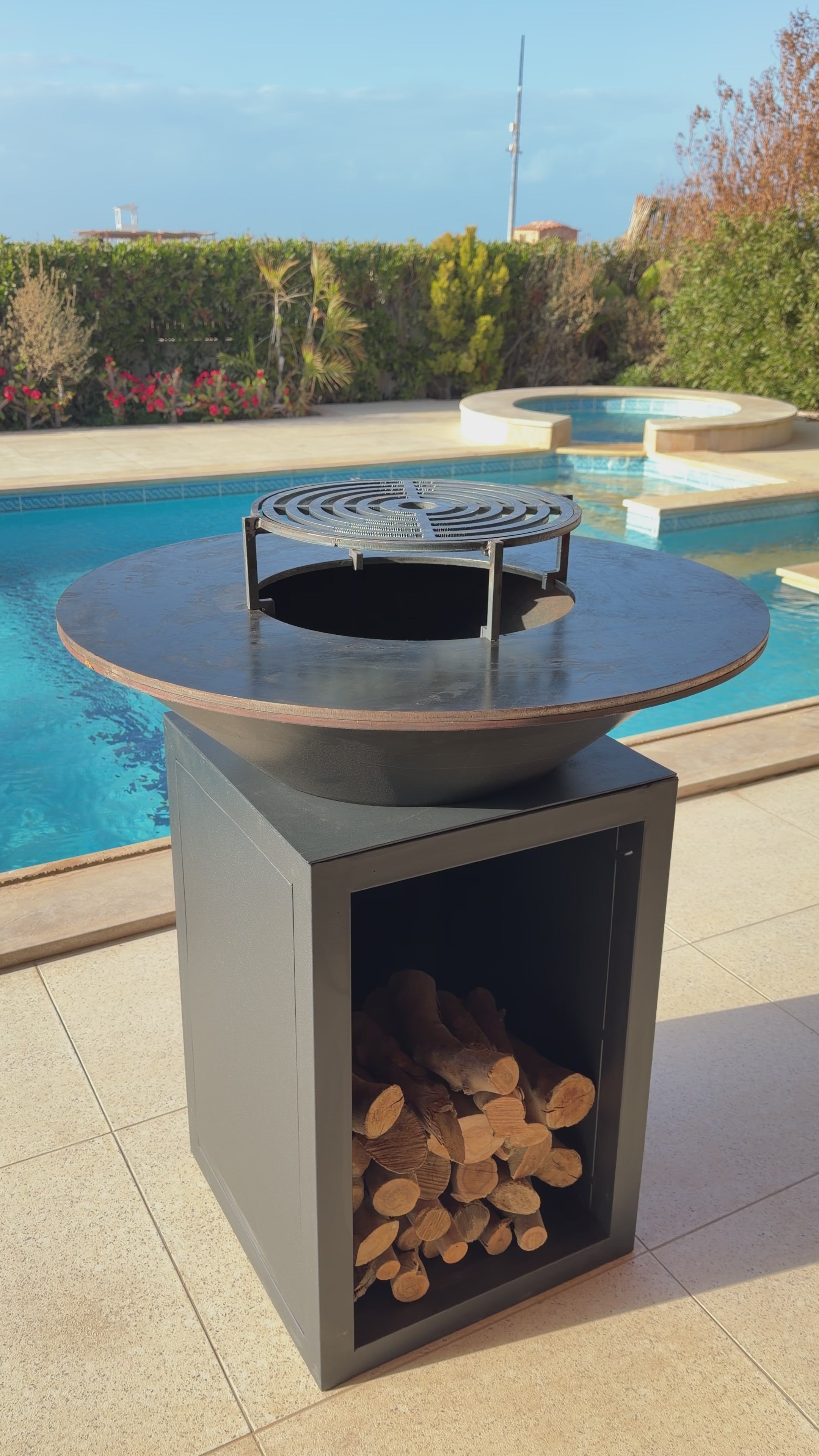 Wood burning fire bowl of Grillit ARK 80 outdoor grill for smoky flavor